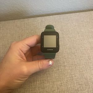Garmin Forerunner watch. 9 colors of band replacements. Charger. Good condition.